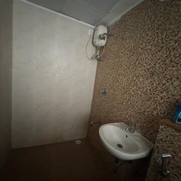 Bathroom in 1 BHK Apartment at Lodha Palava Downtown, Taloja Bypass Road – for Rent