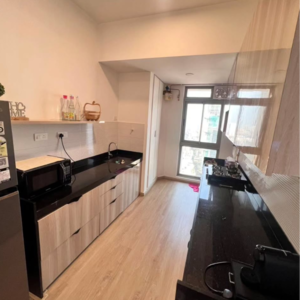 Kitchen in 2 BHK Apartment at Transcon Triumph Tower, Veera Desai Industrial Estate – for Sale