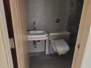 Bathroom in 1 BHK Apartment at JP Eminence, Andheri West – for Rent