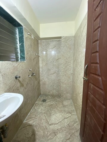Bathroom in 1 BHK Apartment at Lodha Golden Dream, Dombivli East – for Rent