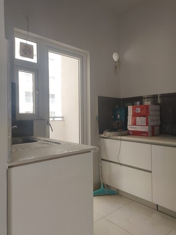 Kitchen in 3 BHK Apartment at Central Park Flower Valley Aqua Front Towers, Sohna Sector 33 – for Rent