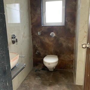 Bathroom in 1 BHK Apartment at Glasswood Om Sarjan CHSL, Dalvi Nagar – for Sale