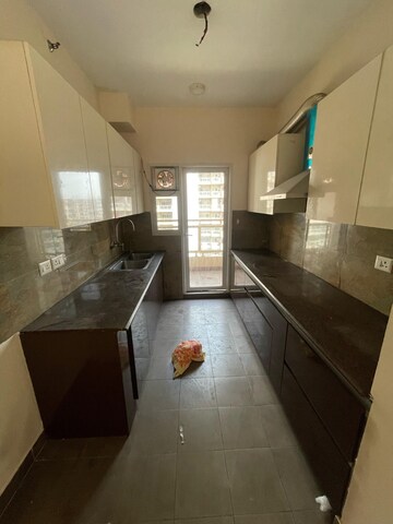 Kitchen in 2 BHK Apartment at Elite Golf Green, Sector 79 – for Rent