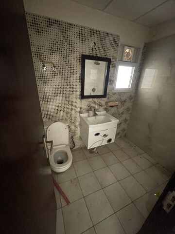 Bathroom in 2 BHK Apartment at Elite Golf Green, Sector 79 – for Rent