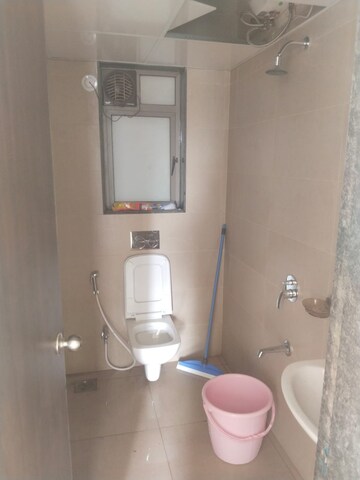 Bathroom in 2 BHK Apartment at Balkum Pada – for Rent
