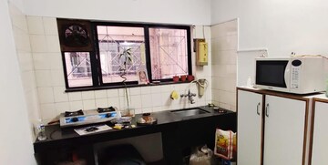 Kitchen in 2 BHK Apartment at Mokate Tower, Bhusari Colony – for Rent