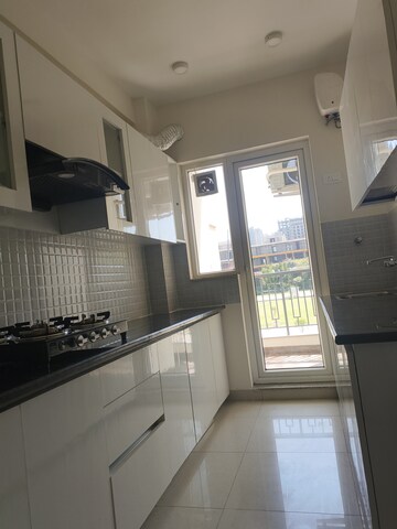 Kitchen in 3 BHK Builder Floor at Breez Flora Avenue 33, Sohna Sector 33 – for Rent