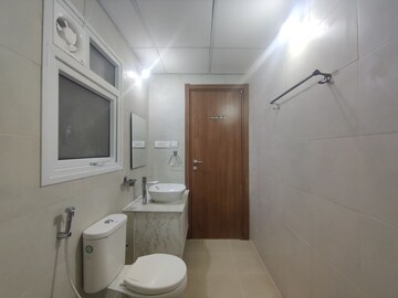 Bathroom in 2 BHK Apartment at Bhartiya Nikoo Homes, Thanisandra Main Road – for Sale