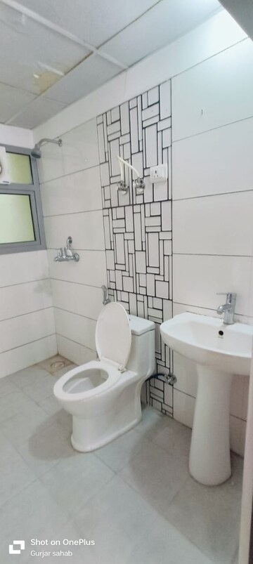 Bathroom in 1.5 BHK Apartment at Mahagun Mywoods, Sector 16c Greater Noida – for Rent