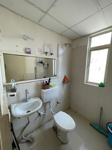 Bathroom in 2 BHK Apartment at Conscient Habitat 78, Sector 78 – for Rent
