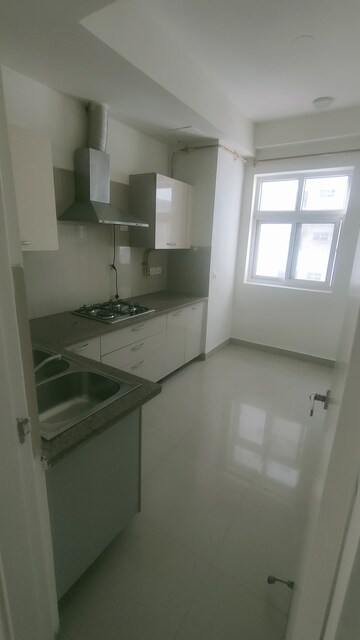 Kitchen in 3 BHK Apartment at Emaar MGF The Palm Drive Villas, Sector 66 – for Rent