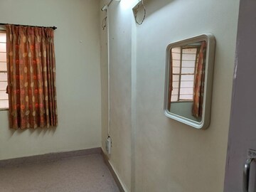 Bedroom in 2 BHK Apartment at Runwal Meadows, Warje – for Rent