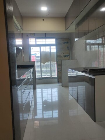 Kitchen in 2 BHK Apartment at Cosmos Habitat, Majiwada – for Rent