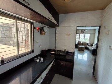 Kitchen in 2 BHK Apartment at Mahalaxmi Tower Kasarvadavali, Kasarvadavali – for Rent