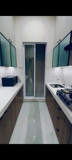 Kitchen in 2 BHK Apartment at Vihang Golden Hills, Owale – for Sale
