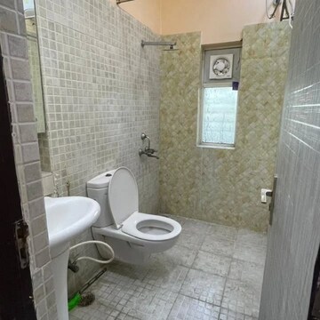 Bathroom in 2 BHK Apartment at Paras Tierea, Sector 137 – for Rent