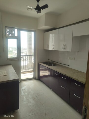 Kitchen in 4 BHK Apartment at DLF New Town Heights III, Sector 91 – for Rent