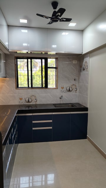 Kitchen in 1 BHK Apartment at Magarpatta City Heliconia, Hadapsar – for Rent