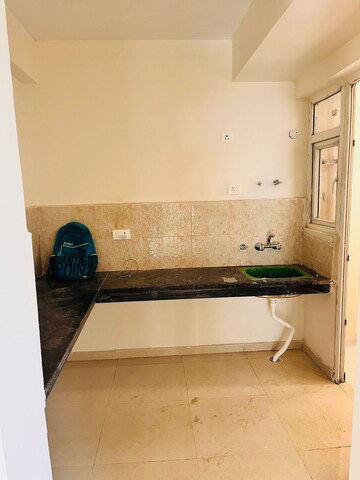 Kitchen in 2 BHK Apartment at Signature The Millennia 2, Sector 37d – for Rent