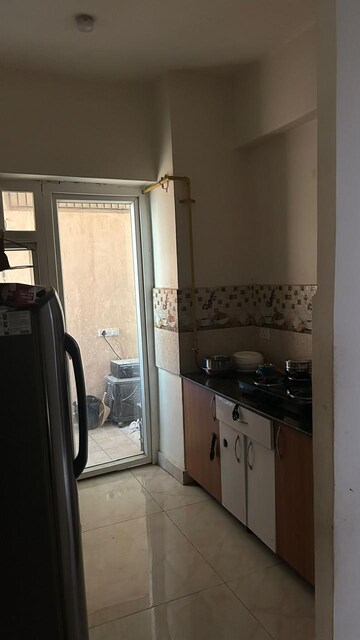 Kitchen in 3 BHK Apartment at Gaurs Siddhartham, Siddharth Vihar – for Rent