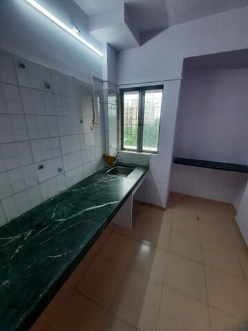 Kitchen in 1 BHK Apartment at Shree Prastha CHS, Owale – for Rent