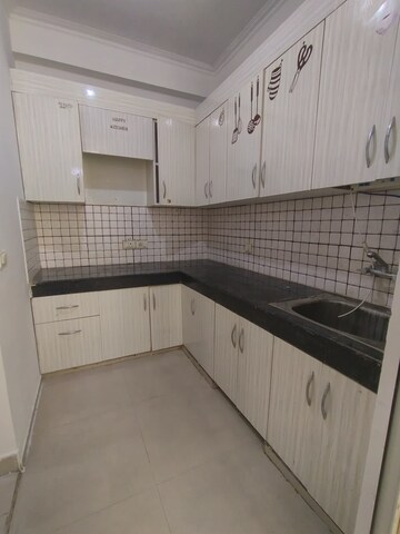 Kitchen in 1.5 BHK Apartment at Mahagun Mywoods, Sector 16c Greater Noida – for Rent