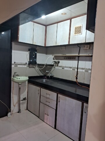 Kitchen in 1 BHK Apartment at Ajmera Bhakti Park, Bhakti Park – for Rent