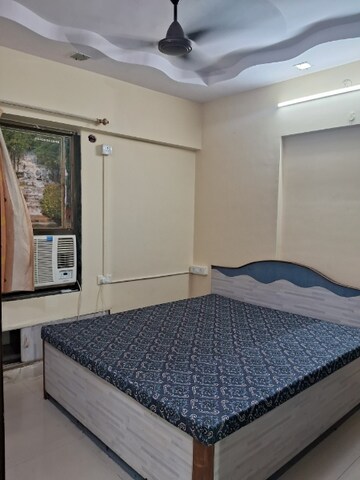 Bedroom in 1 BHK Apartment at Ajmera Bhakti Park, Bhakti Park – for Rent