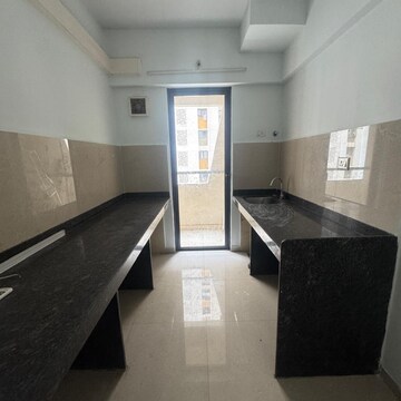 Kitchen in 1.5 BHK Apartment at Lodha Palava Fontana C To H, Taloja Bypass Road – for Rent