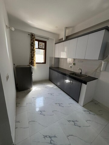 Kitchen in 1 RK Builder Floor at Ansal Sushant Lok I, Sector 43 – for Rent