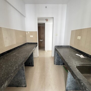 Kitchen in 1 BHK Apartment at Lodha Palava City Lakeshore Greens, Hedutane – for Rent