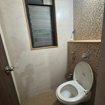 Bathroom in 1 BHK Apartment at Lodha Palava City Lakeshore Greens, Hedutane – for Rent