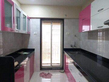 Kitchen in 1 BHK Apartment at Rosa Royale, Ghodbunder Road – for Sale