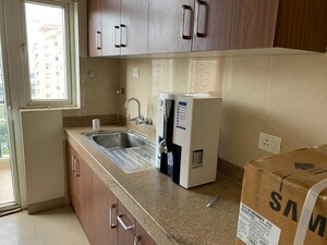 Kitchen in 3 BHK Apartment at Dhoot Time Residency, Sector 63 – for Sale