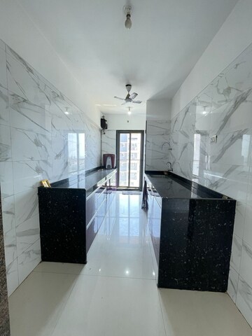 Kitchen in 3 BHK Apartment at Neminath Luxeria, Andheri West – for Sale