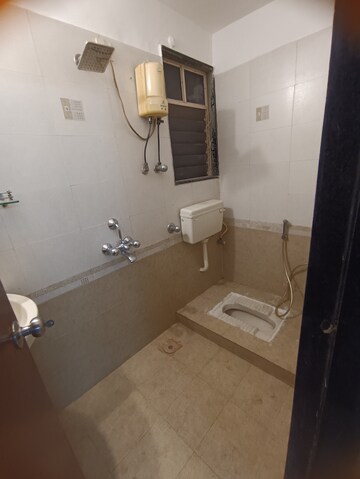 Bathroom in 1 BHK Apartment at Bhoomi Park, Malad West – for Rent