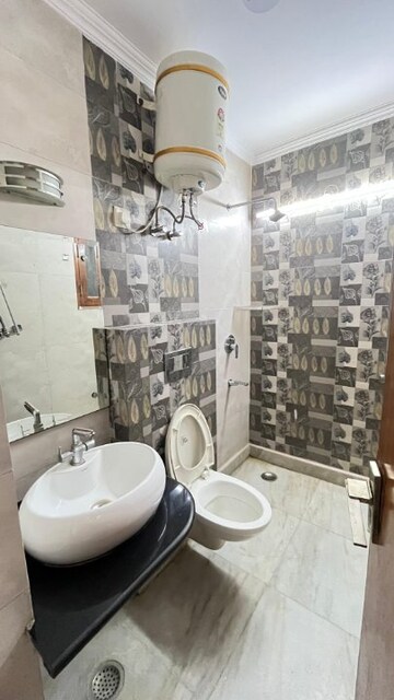 Bathroom in 3 BHK Builder Floor at DLF Hamilton Court, Sector 27 – for Rent