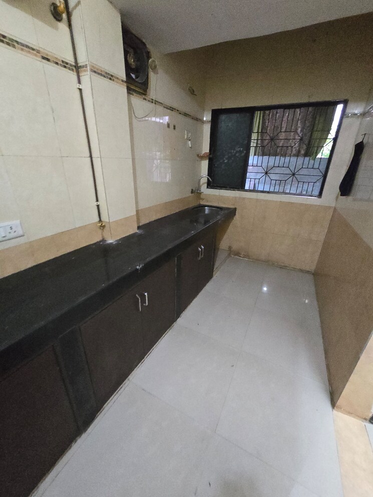 Kitchen, lucky-chs 2 Bedroom 900 Sq.Ft. Apartment In Kopar Khairane Navi Mumbai 8803890