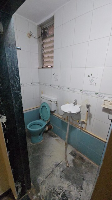 Bathroom in 2 BHK Apartment at Lucky CHS, Kopar Khairane – for Rent