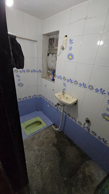 Bathroom in 2 BHK Apartment at Lucky CHS, Kopar Khairane – for Rent