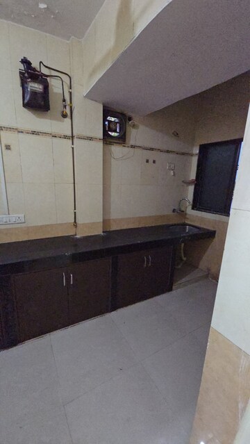 Kitchen in 2 BHK Apartment at Lucky CHS, Kopar Khairane – for Rent