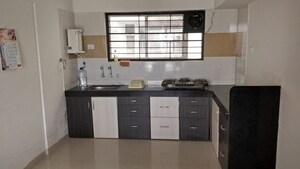 Kitchen in 1 BHK Apartment at Vasant Complex Bhugaon, Bhugaon – for Sale
