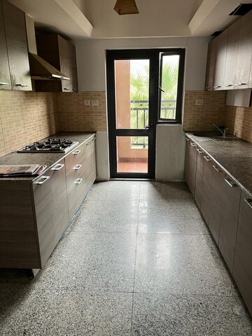 Kitchen in 3 BHK Apartment at Raheja Vedas, Sector 108 – for Rent