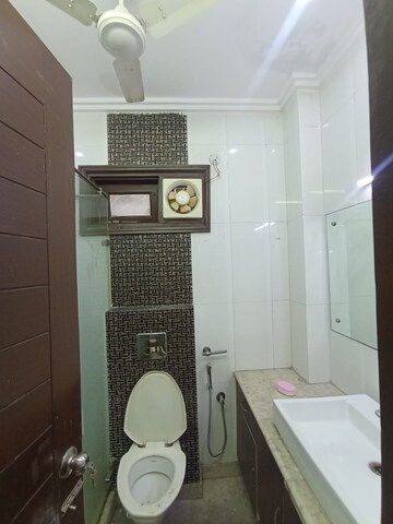 Bathroom in 3 BHK Apartment at East Patel Nagar – for Rent