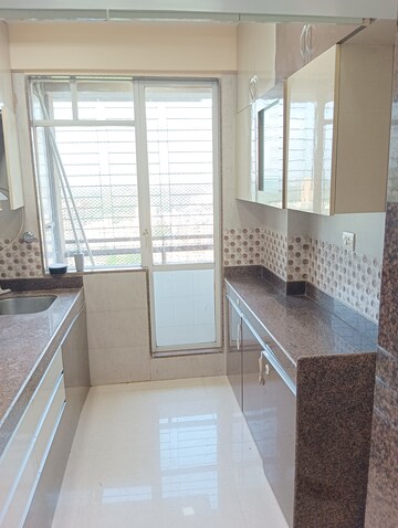 Kitchen in 2 BHK Apartment at Ajmera New Era, Kalyan West – for Sale