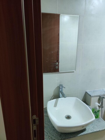 Bathroom in 3 BHK Apartment at Bhartiya City Nikoo Homes II, Thanisandra Main Road – for Rent