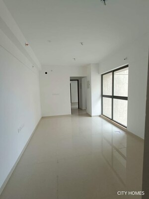 Living Room in 1 BHK Apartment at Lodha Palava Downtown Dombivli East, Dombivli East – for Sale