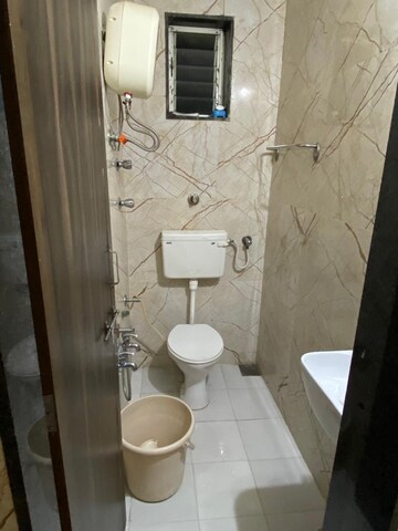 Bathroom in 3 BHK Apartment at Ramdevnagar – for Rent