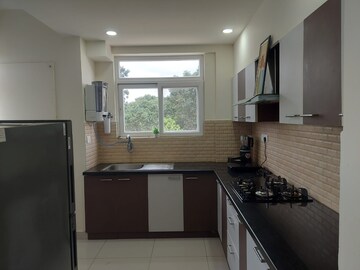 Kitchen in 2 BHK Apartment at Coevolve Northern Star, Thanisandra – for Rent