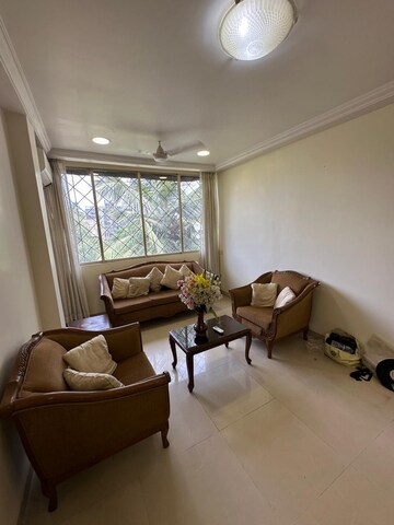 Living Room in 2 BHK Apartment at Benmar CHS, Bandra West – for Rent